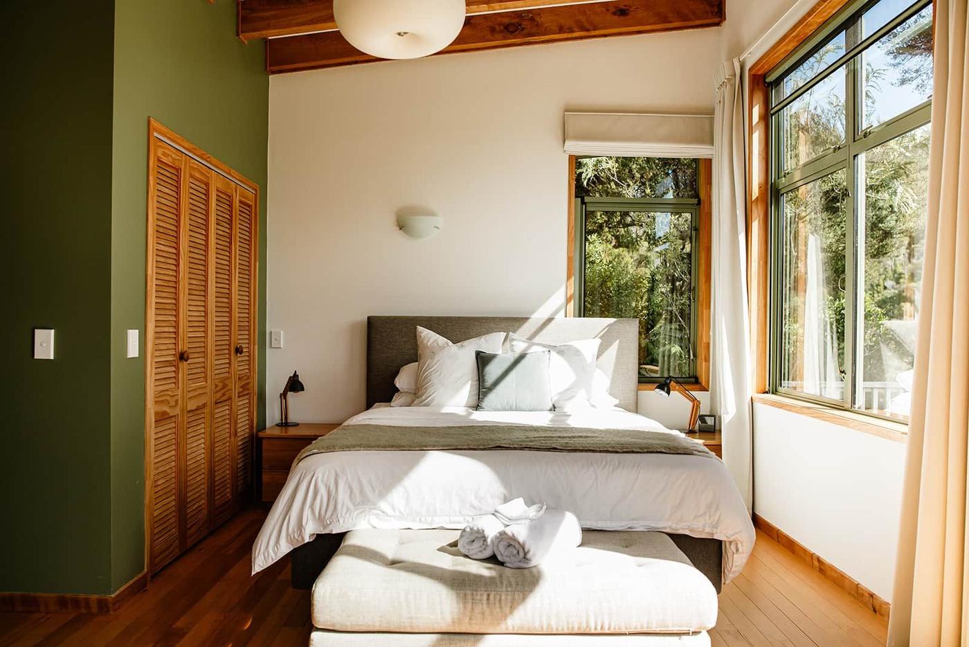 Second bedroom with garden views