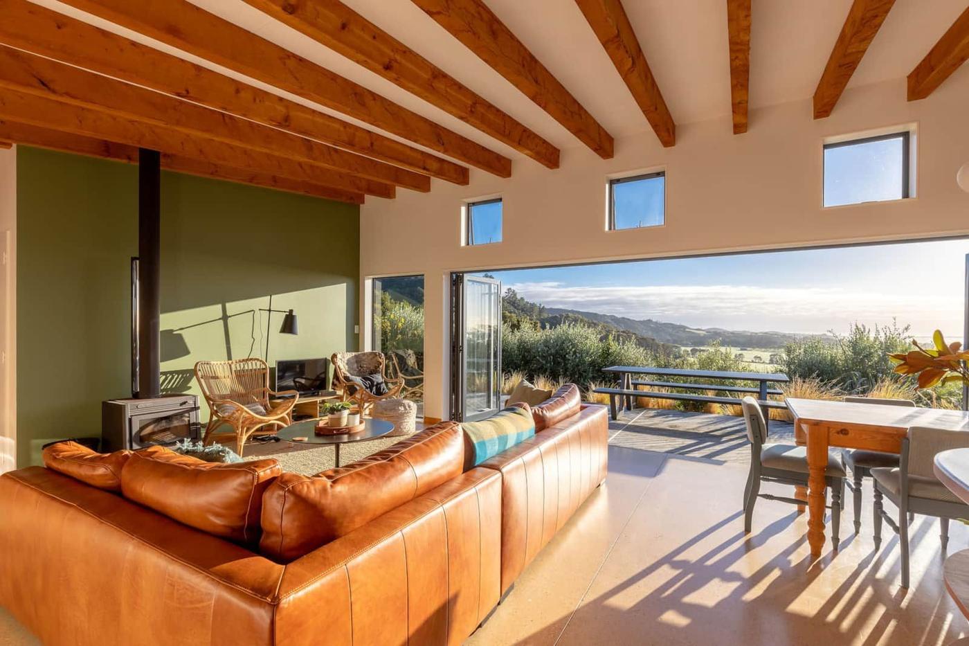 Lounge and dining area with timber beams